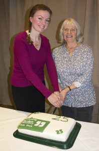 Jenny Smith and Annette Scobie cut the anniversary cake